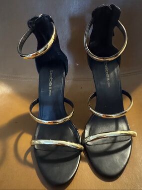 bebe Black Sandal Heels with Gold Bands